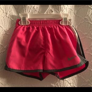 Pink and grey Nike shorts